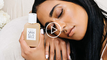 MODEL HOLDING VANILLA MILK EAU DE PARFUM